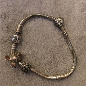 Pandora bracelet with three charms